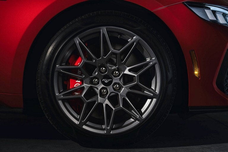 2024 Ford Mustang® model with a close-up of a wheel and brake caliper | VonDerAu Ford in El Campo TX