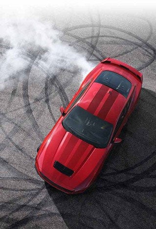 Overhead view of a 2024 Ford Mustang® model with tire tracks on pavement | VonDerAu Ford in El Campo TX